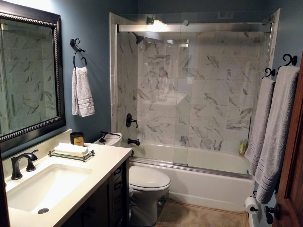 The finished look of this bathroom remodel blends color and texture nicely.