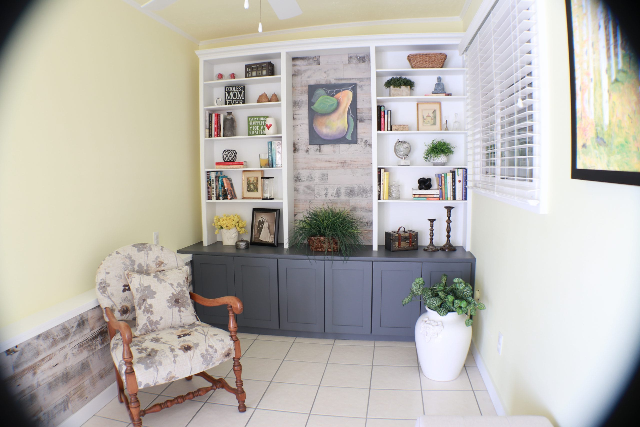 A base cabinet and shelving make up this Arizona room built-in.