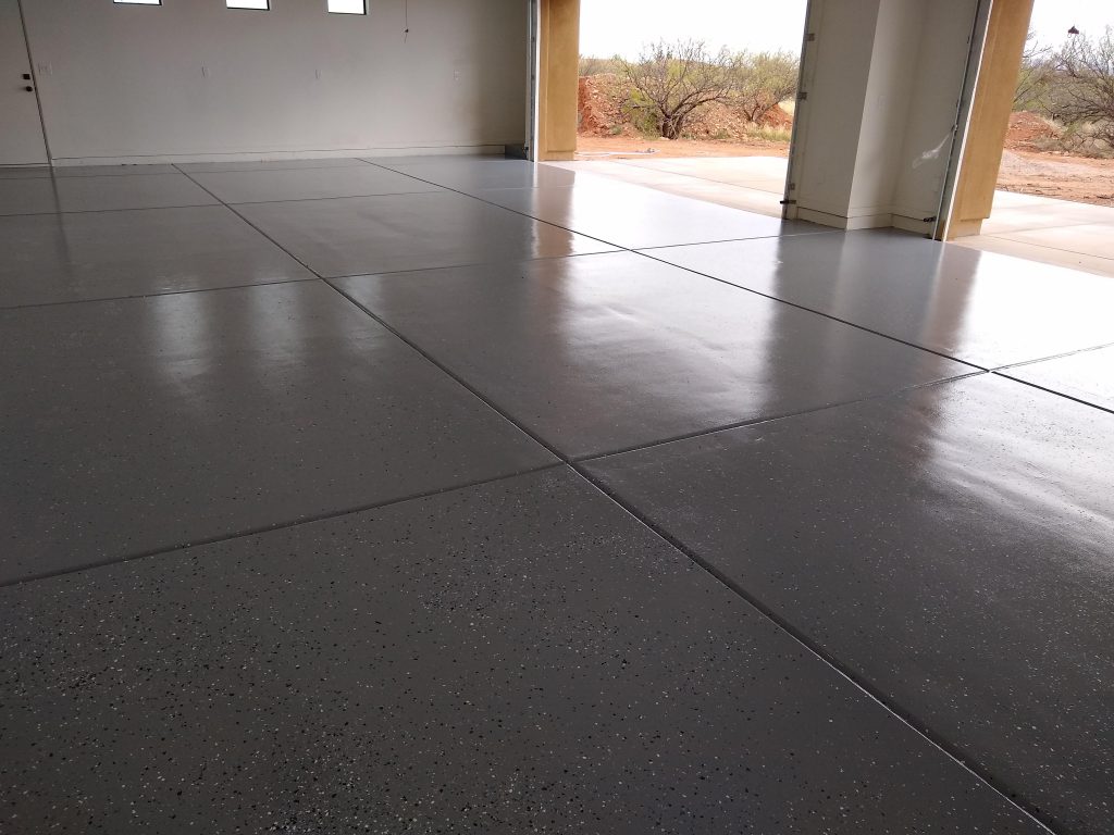 A spacious garage floor has a clean look with this epoxy finish.