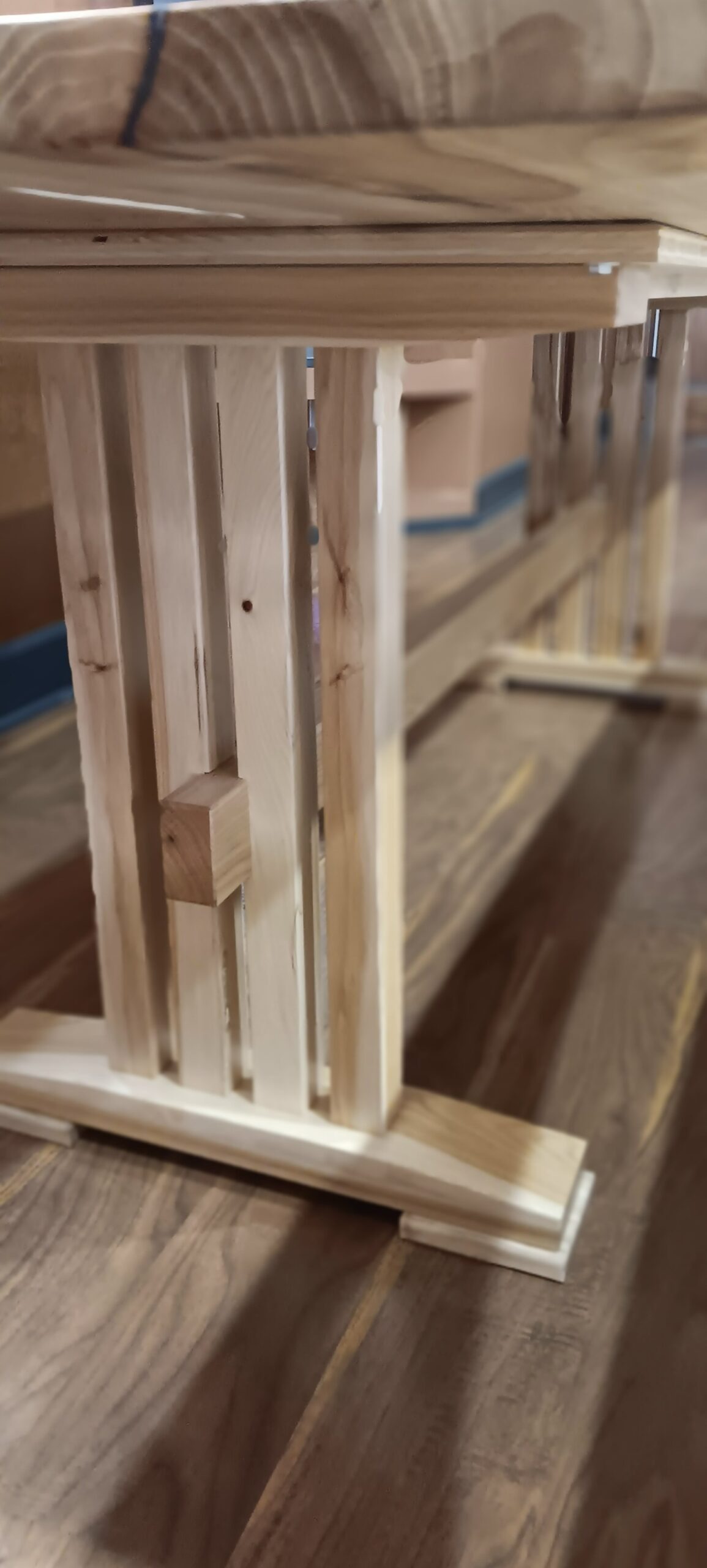 The leg assembly in this trestle table highlights the beautiful sapwood in this hickory.